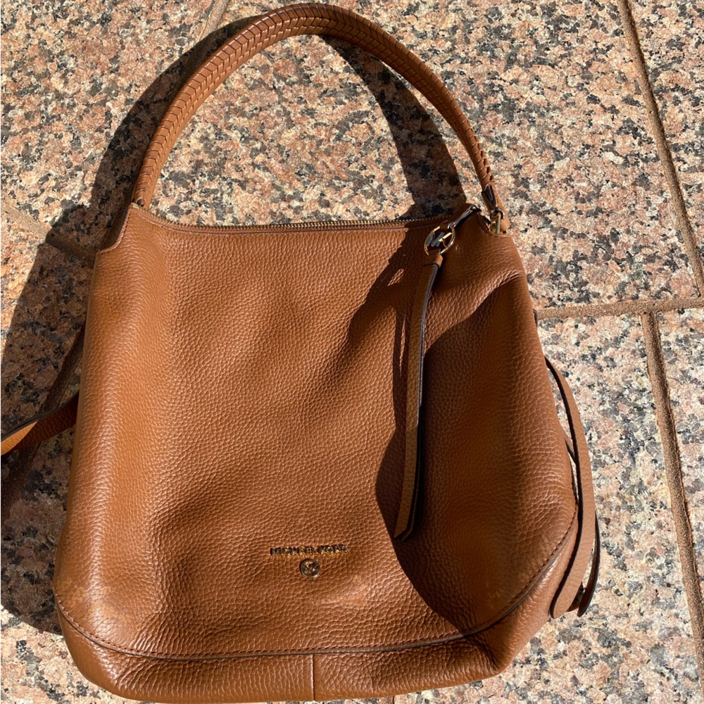 Michael Kors light brown bag.